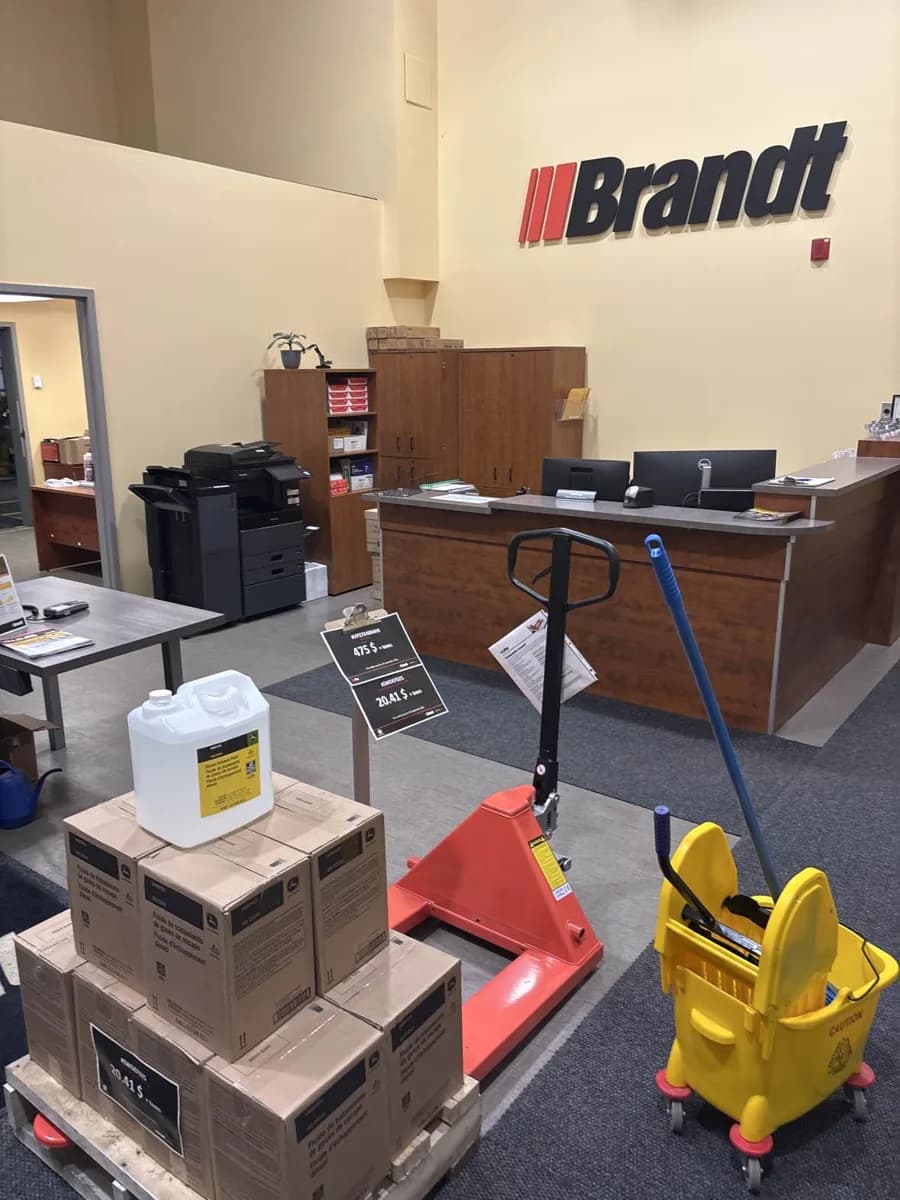 Cleaning equipment beside the Brandt reception counter in Brossard.