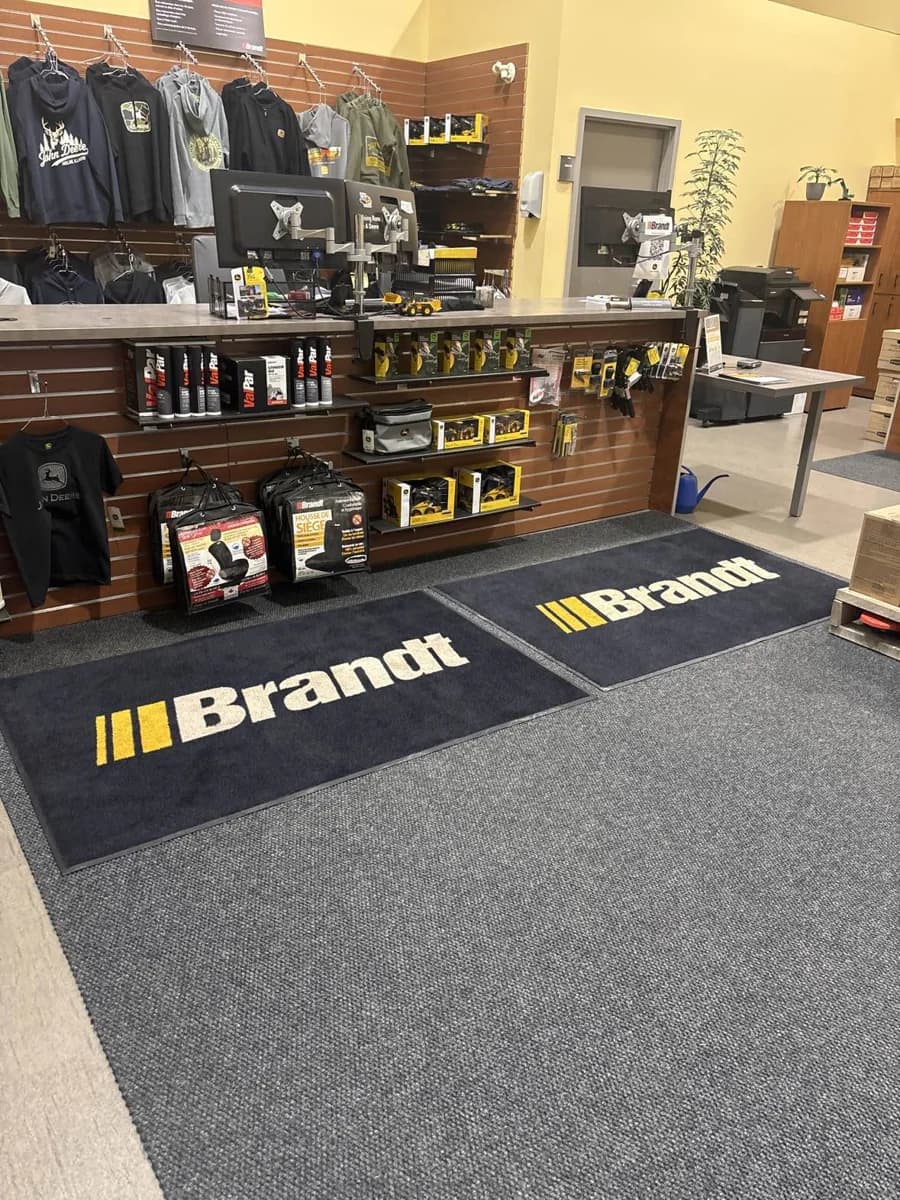 Brandt showroom in Brossard, with carpeting and entrance mats.